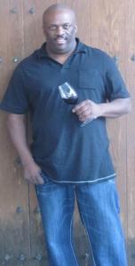 Raymond Smith with glass of wine